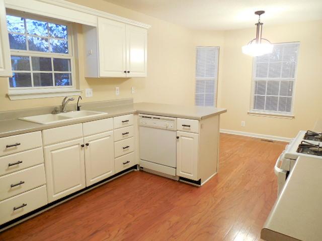 314 Thetahill Road Murfreesboro, TN 37130 - Photo 5 of 19 Kitchen with Hardwood Floors, Stove, Microwave, Dishwasher and Refrigerator to Remain