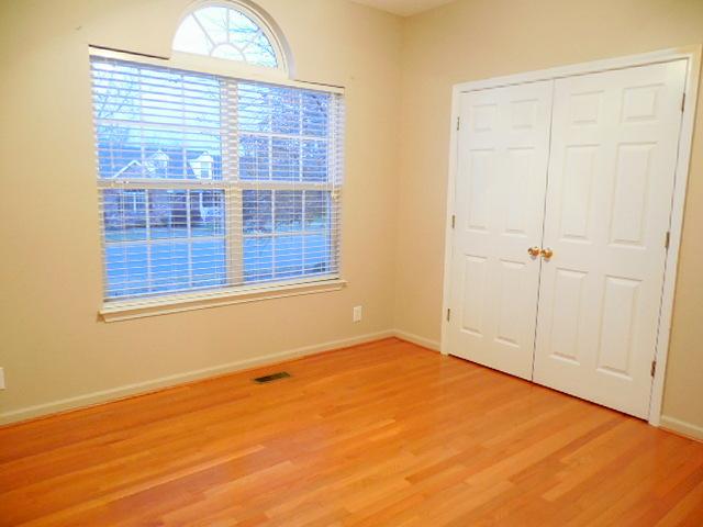 314 Thetahill Road Murfreesboro, TN 37130 - Photo 9 of 19 Bedroom 2 on Main Level with Hardwood Floors and Big Palladium Window