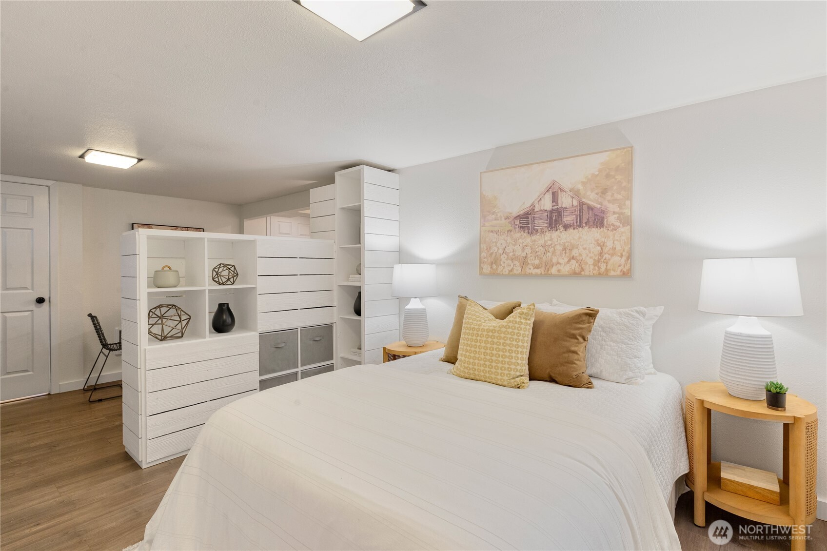 16406 Sylvester Road Southwest Burien, WA 98166 - Photo 18 of 28 a bedroom with a bed and a couch