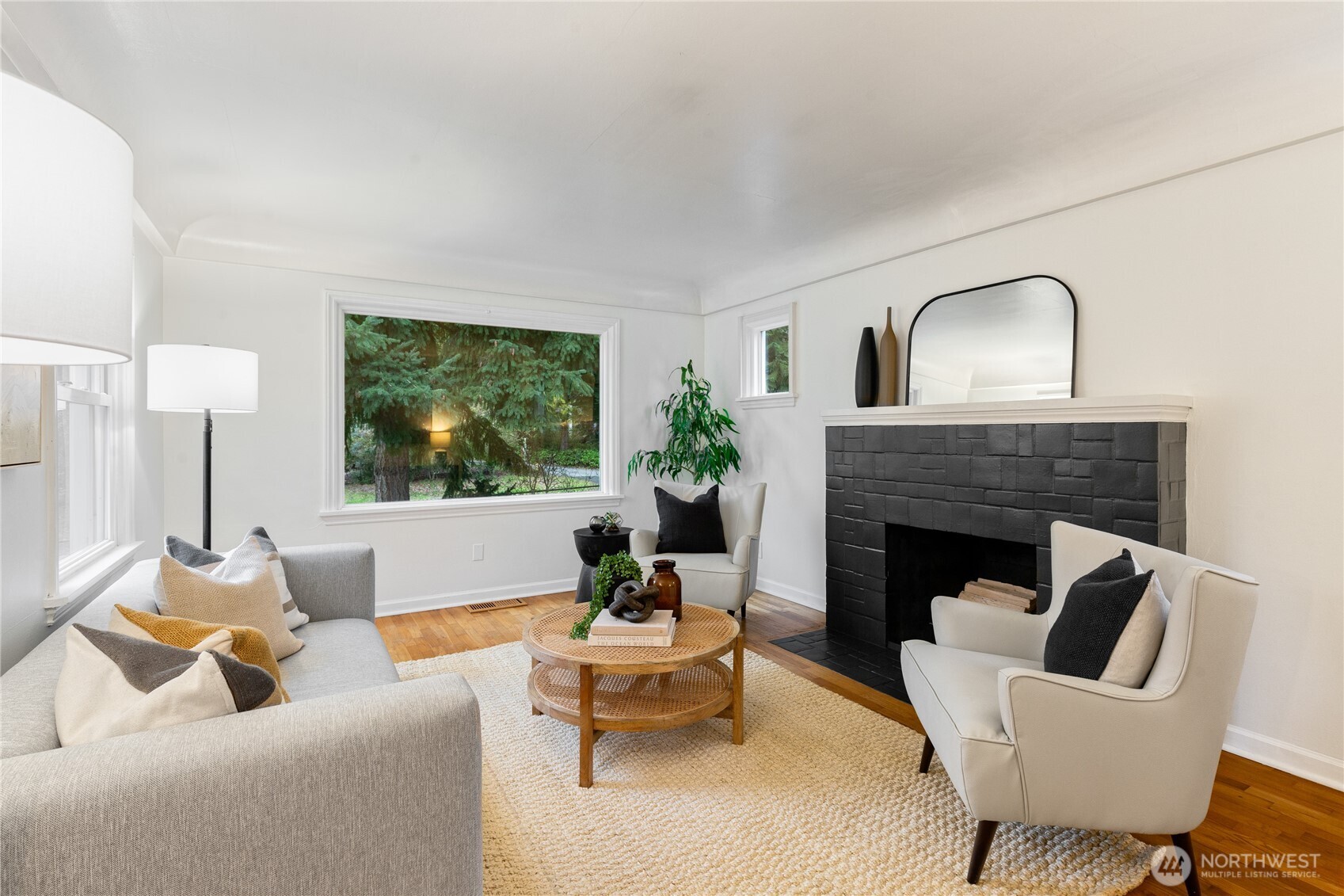 16406 Sylvester Road Southwest Burien, WA 98166 - Photo 3 of 28 a living room with furniture and a fireplace