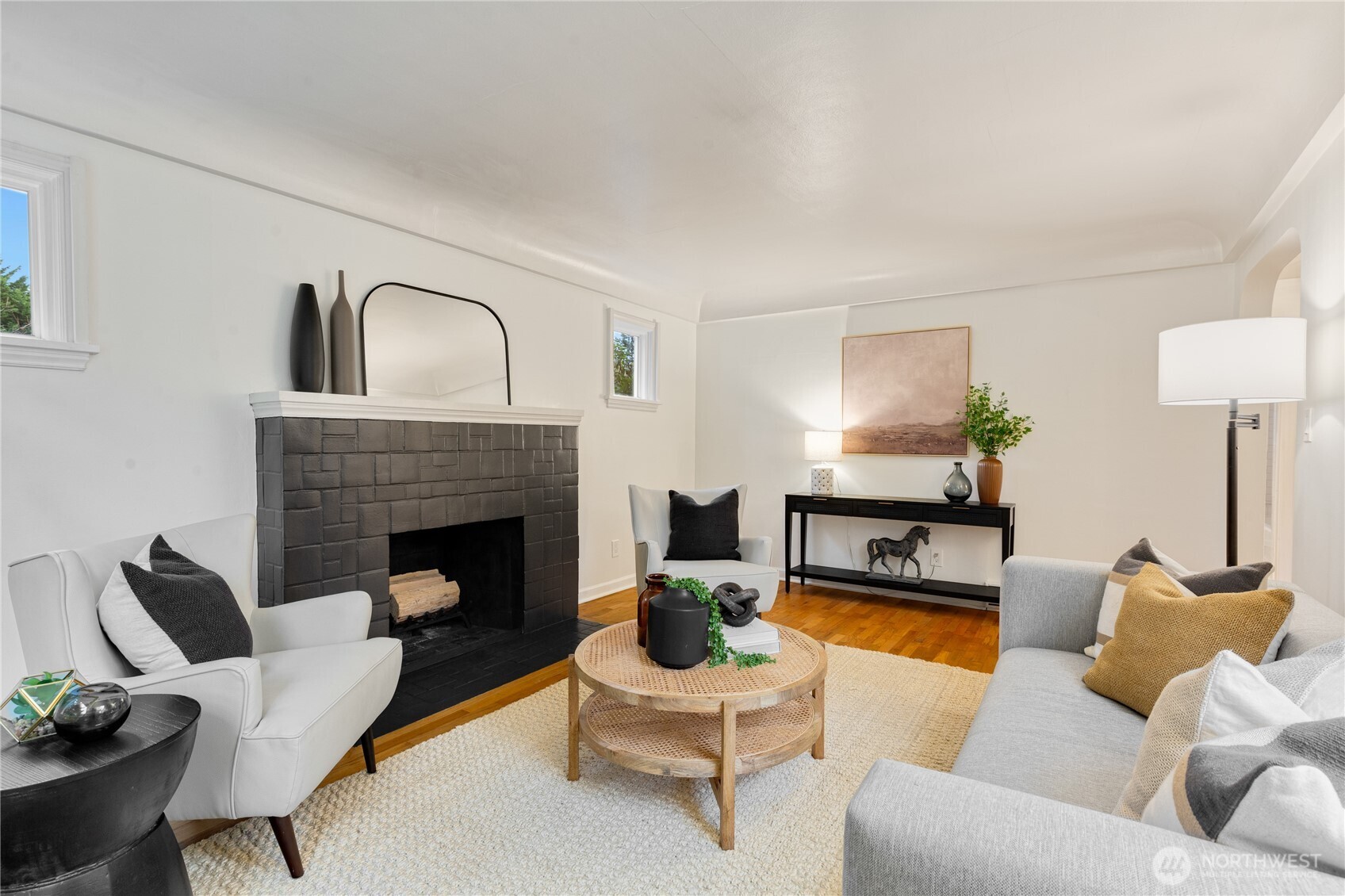 16406 Sylvester Road Southwest Burien, WA 98166 - Photo 4 of 28 a living room with furniture and a fireplace