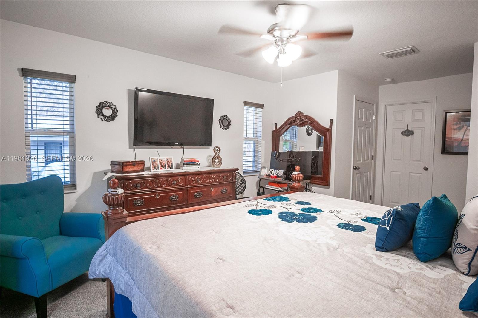 1123 East Bucknell Avenue Inverness, FL 34450 - Photo 11 of 13 a bedroom with a bed and a flat screen tv