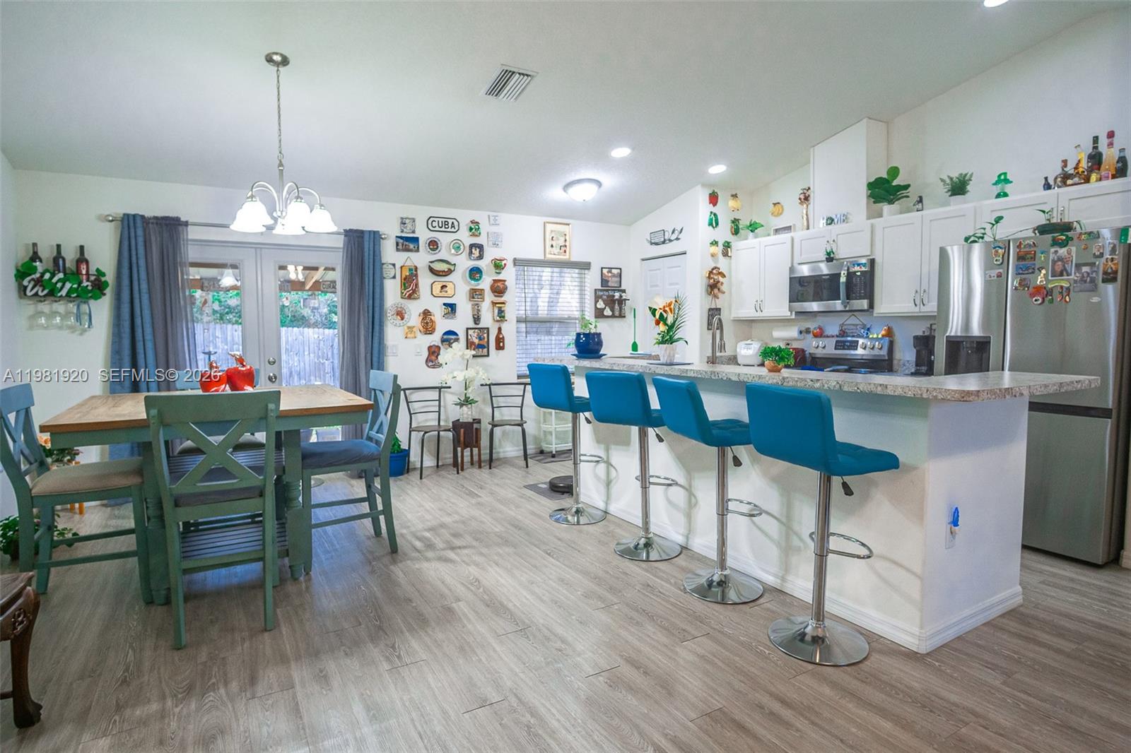 1123 East Bucknell Avenue Inverness, FL 34450 - Photo 8 of 13 a dining room filled with furniture and wooden floor