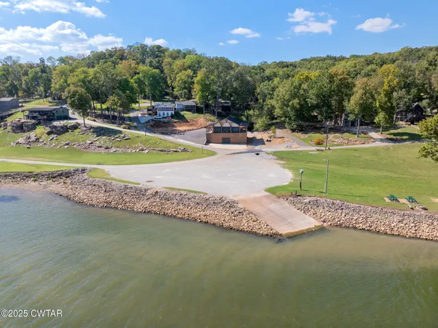 a view of a swimming pool with an outdoor space and seating area