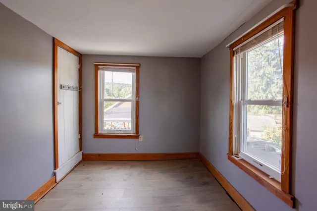 an empty room with windows