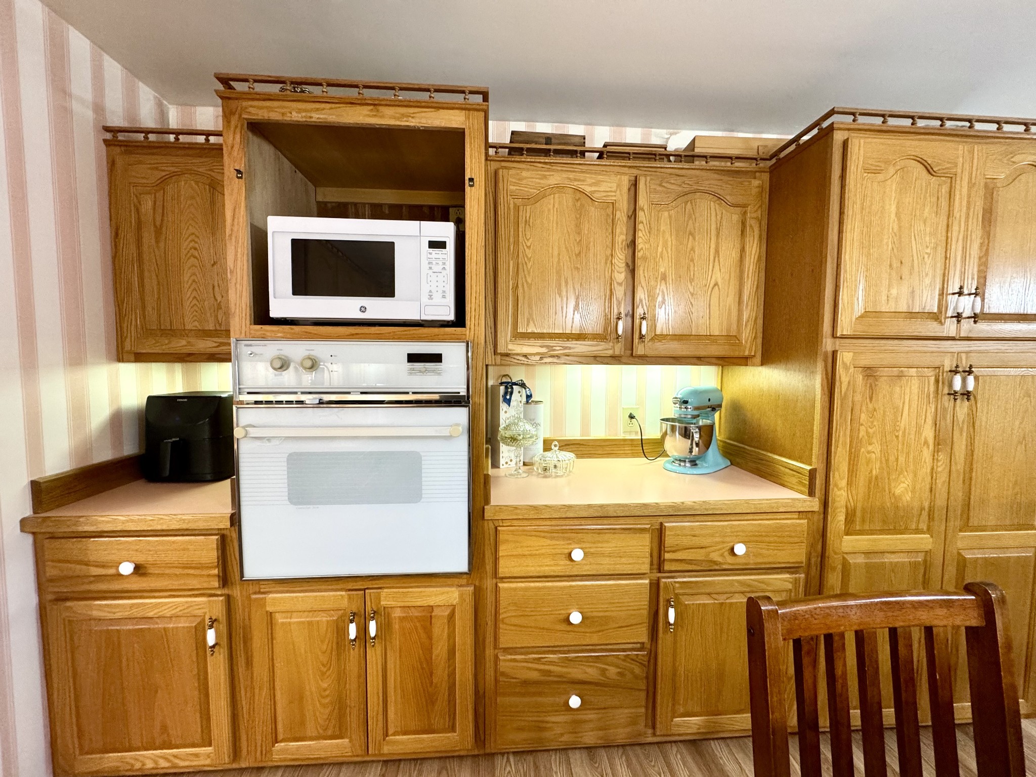 471 Old Pond Lane Dickson, TN 37055 - Photo 8 of 46 a kitchen with a refrigerator and a stove