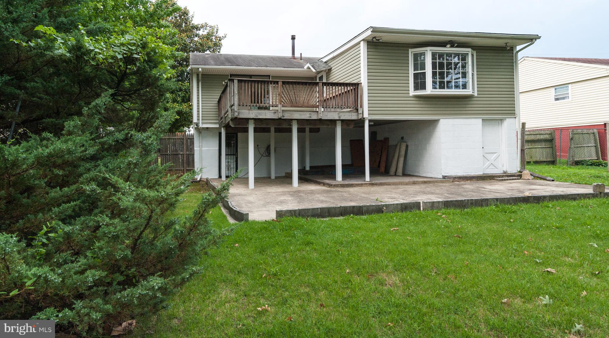 5702 Westgate Road Lanham, MD 20706 - Photo 22 of 22 a view of house with backyard and garden