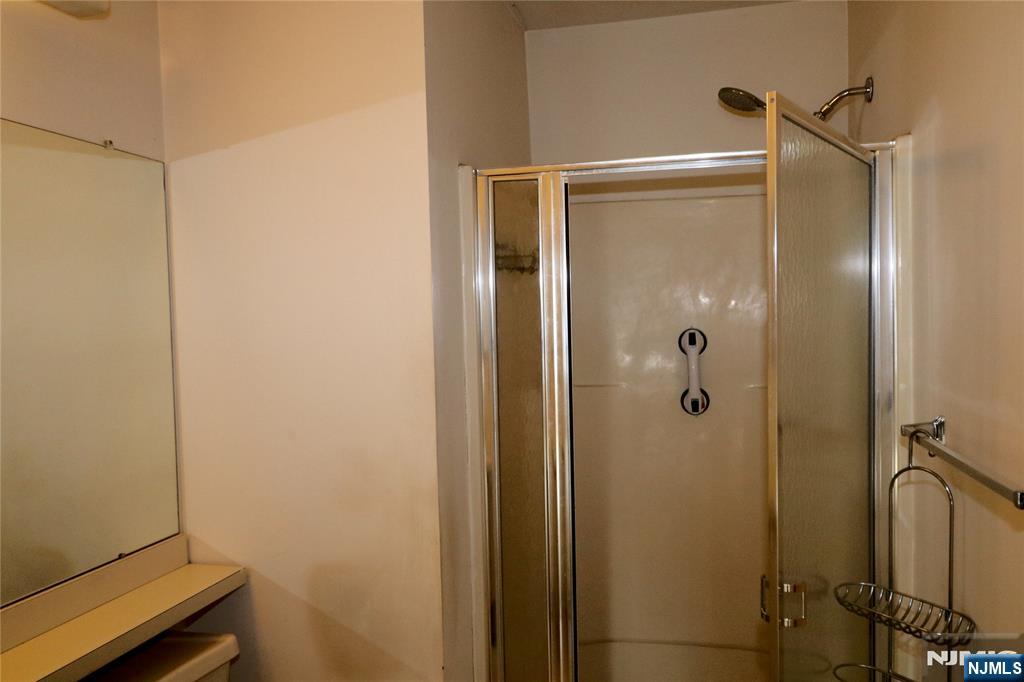 12 Rutgers Drive Newark, NJ 07103 - Photo 16 of 23 a bathroom with a shower