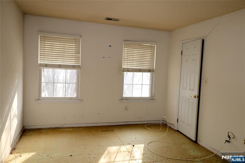 12 Rutgers Drive Newark, NJ 07103 - Photo 17 of 23 an empty room with a window