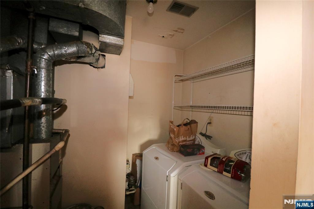 12 Rutgers Drive Newark, NJ 07103 - Photo 9 of 23 a room with storage and utility