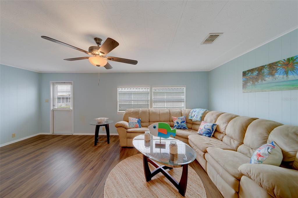 12501 Ulmerton Road, Unit 77 Largo, FL 33774 - Photo 11 of 73 a living room with furniture and a window