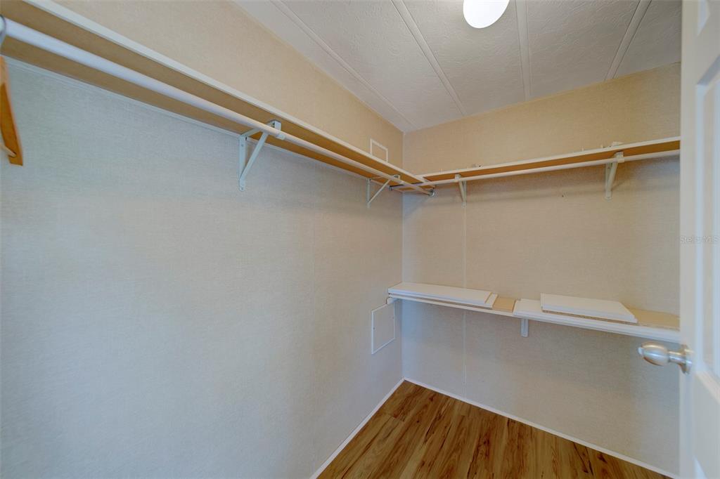 12501 Ulmerton Road, Unit 77 Largo, FL 33774 - Photo 27 of 73 a view of a room with shelf on the wall