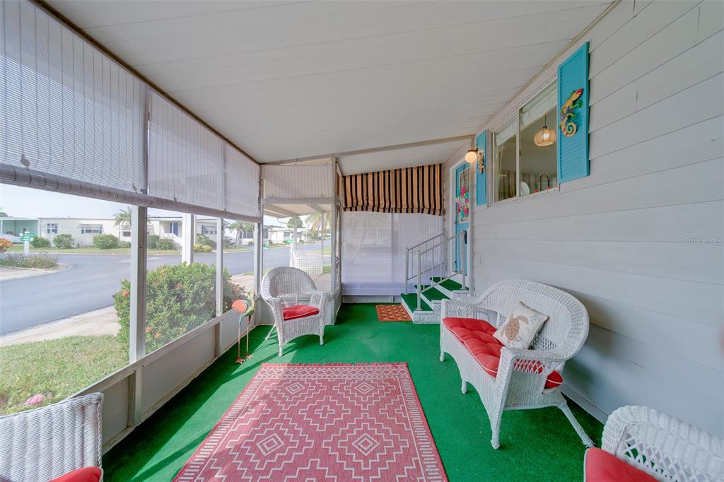 12501 Ulmerton Road, Unit 77 Largo, FL 33774 - Photo 35 of 73 a garden view with a seating space