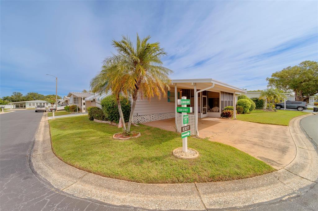 12501 Ulmerton Road, Unit 77 Largo, FL 33774 - Photo 39 of 73 a view of outdoor space yard and swimming pool