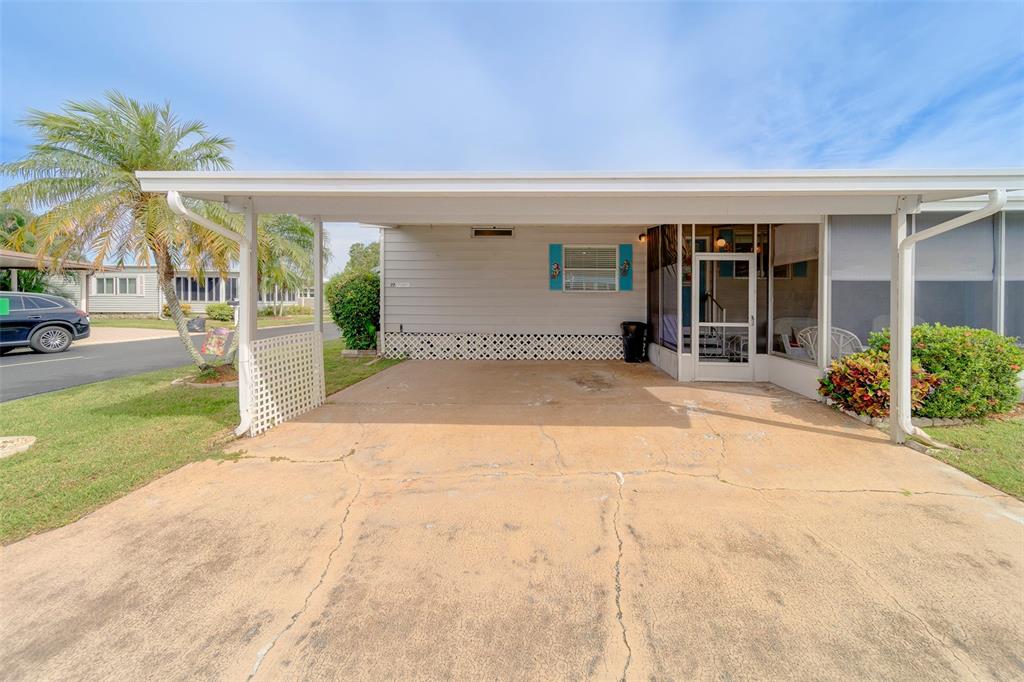 12501 Ulmerton Road, Unit 77 Largo, FL 33774 - Photo 40 of 73 front view of a house with a outdoor space
