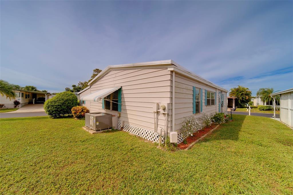 12501 Ulmerton Road, Unit 77 Largo, FL 33774 - Photo 43 of 73 a view of a house with backyard and sitting area