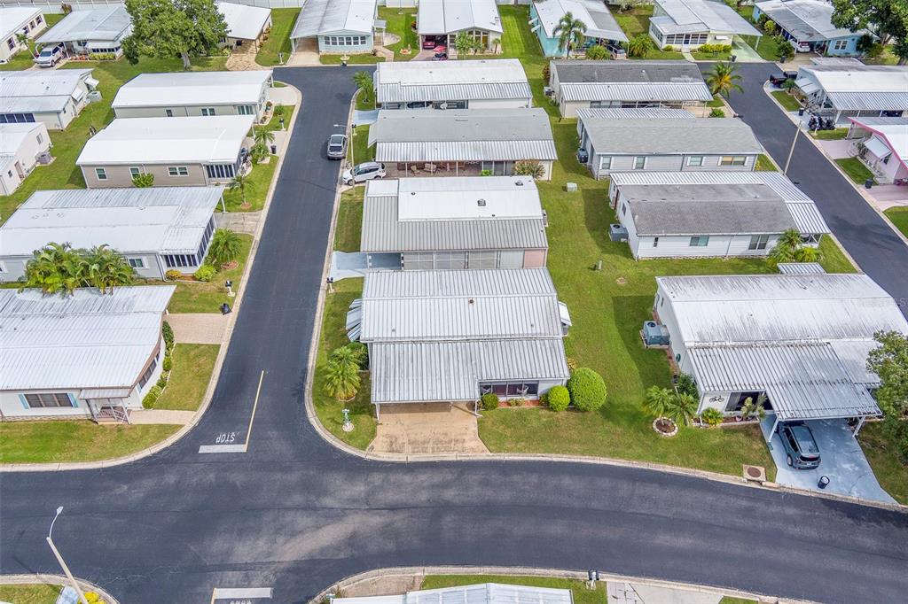12501 Ulmerton Road, Unit 77 Largo, FL 33774 - Photo 56 of 73 an aerial view of a house with a swimming pool