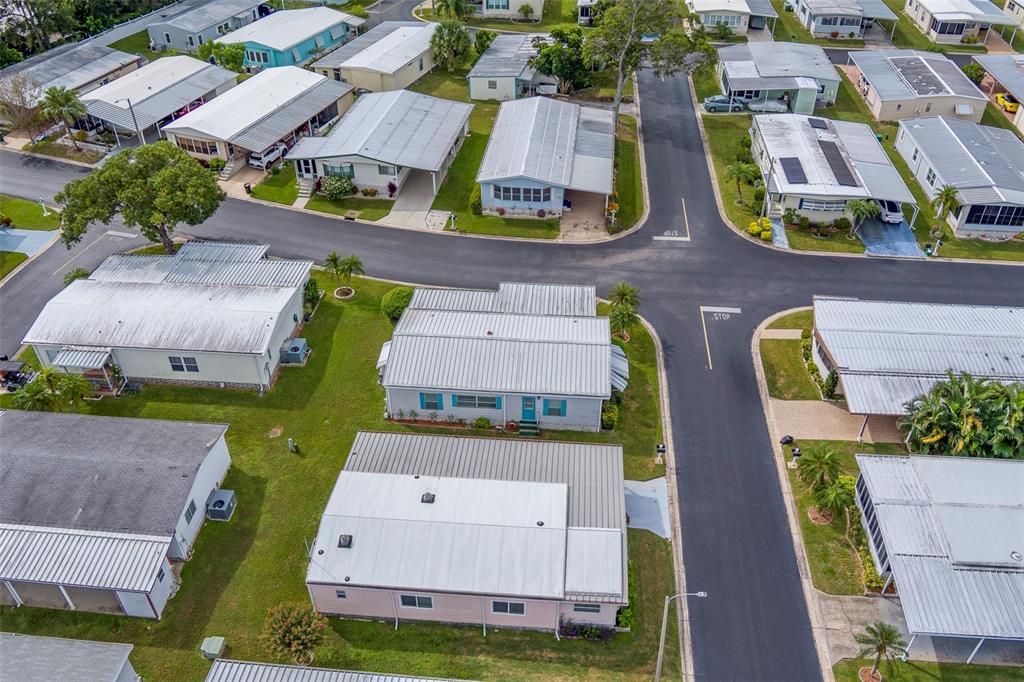 12501 Ulmerton Road, Unit 77 Largo, FL 33774 - Photo 60 of 73 an aerial view of multiple houses with yard