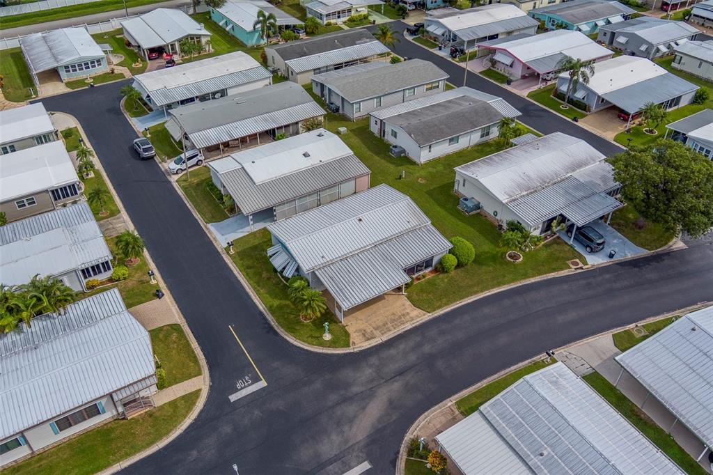 12501 Ulmerton Road, Unit 77 Largo, FL 33774 - Photo 62 of 73 an aerial view of a house with garden space and street view
