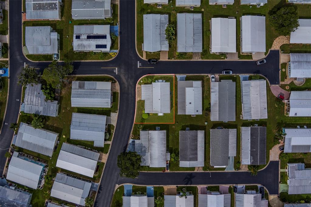 12501 Ulmerton Road, Unit 77 Largo, FL 33774 - Photo 71 of 73 a view of a small building with a small yard