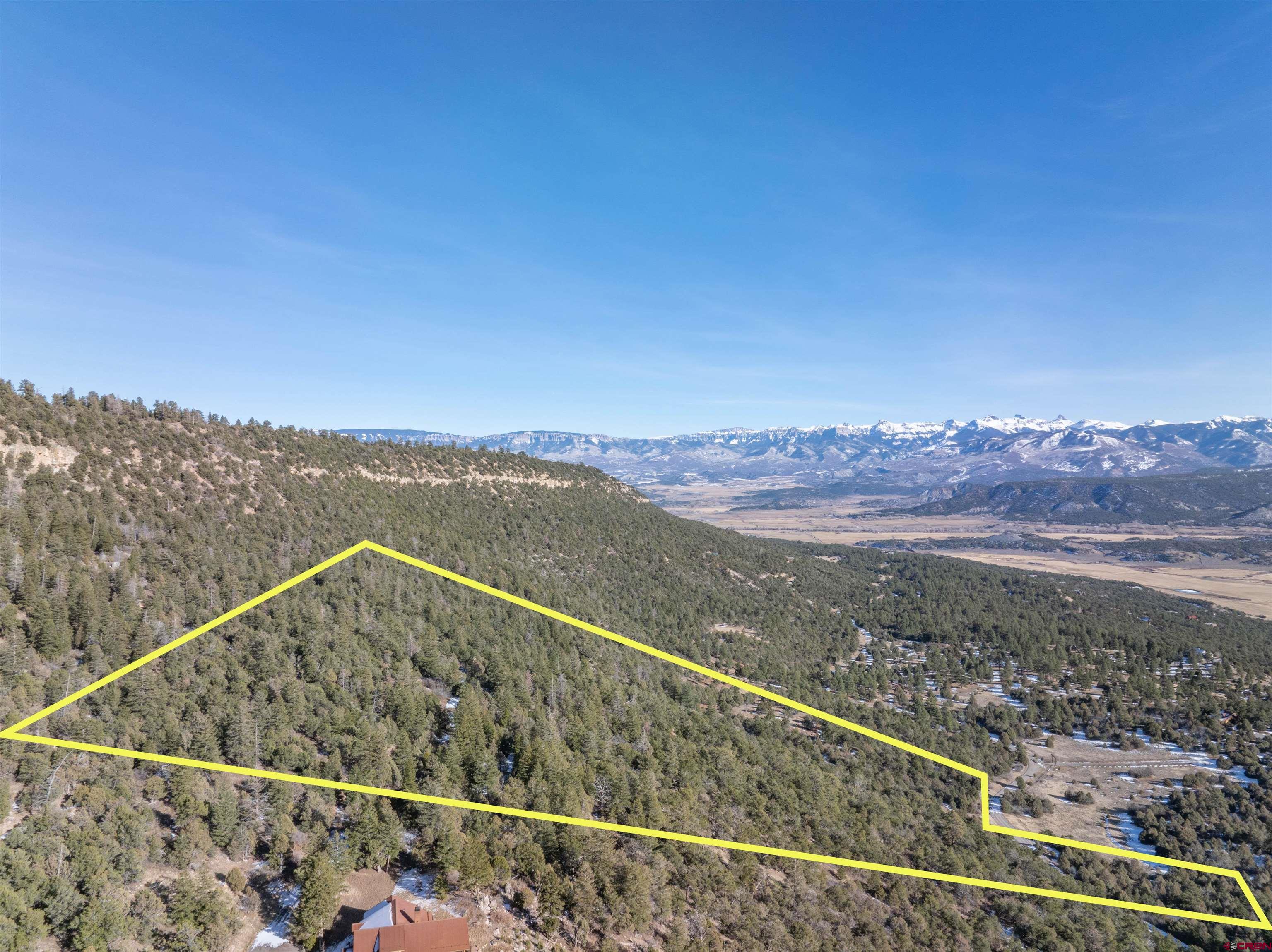 7 Old Relay Road Ridgway, CO 81432 - Photo 10 of 23 a view of a city from a balcony with a floor to ceiling window