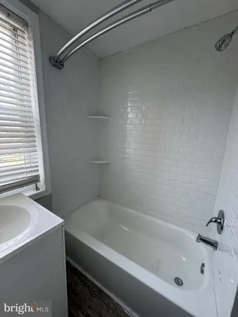 a bathroom with a bathtub