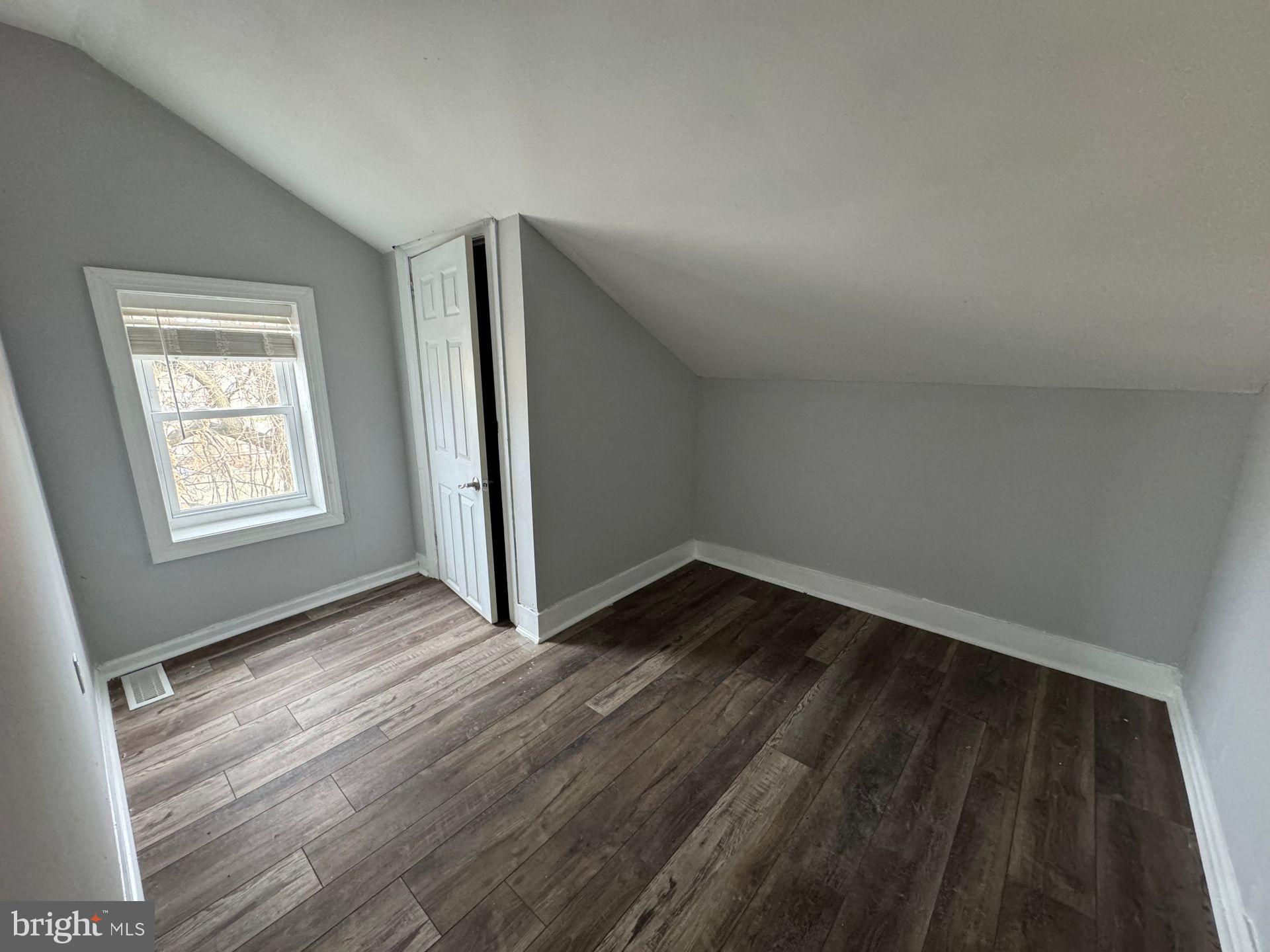 610 9th Street, Unit 2 Chester, PA 19013 - Photo 8 of 8 a view of an empty room and window