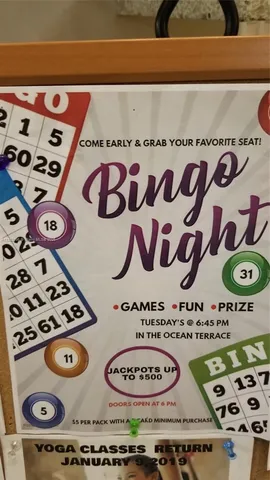 a view of a kitchen with a sink and cabinets