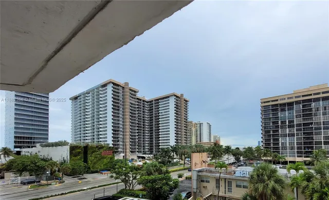 a view of a room with a table and chair
