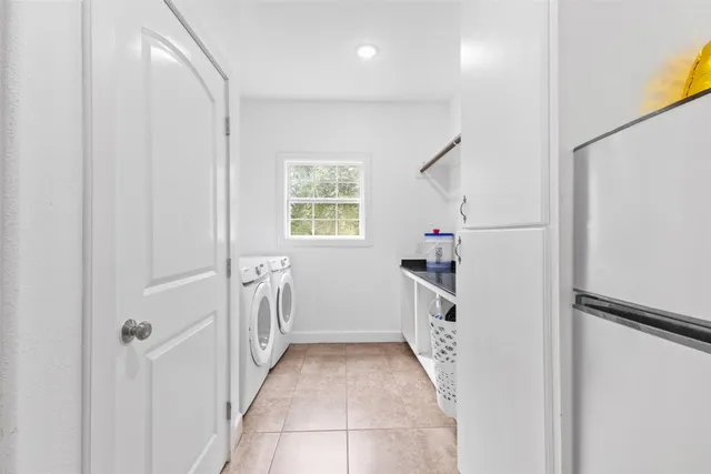 a hallway with cabinets