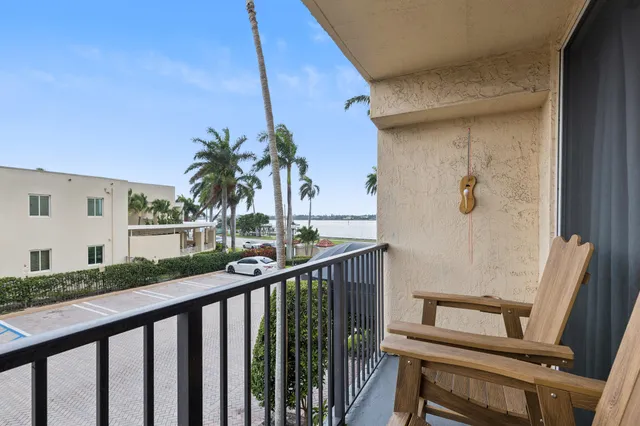 a view of balcony with furniture