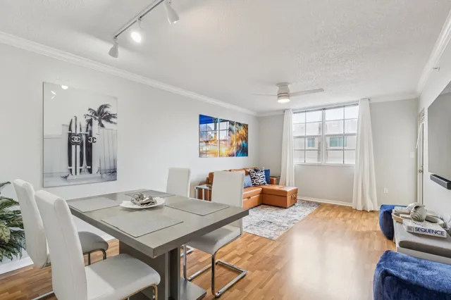 a kitchen with stainless steel appliances granite countertop a sink and a stove