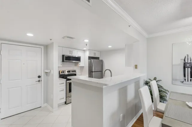 a kitchen with a stove and a microwave