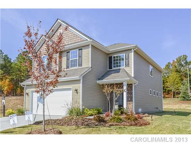 78166 Rillstone Drive, Unit 219 Lancaster, SC 29720 - Photo 1 of 16 a front view of a house with garden