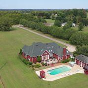 2401 Franklin Road Lebanon, TN 37090 - Photo 4 of 29 an aerial view of a house with swimming pool and lake view