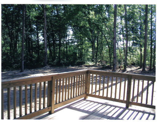 15 Old Stow Road Hudson, MA 01749 - Photo 3 of 3 a view of a wooden fence