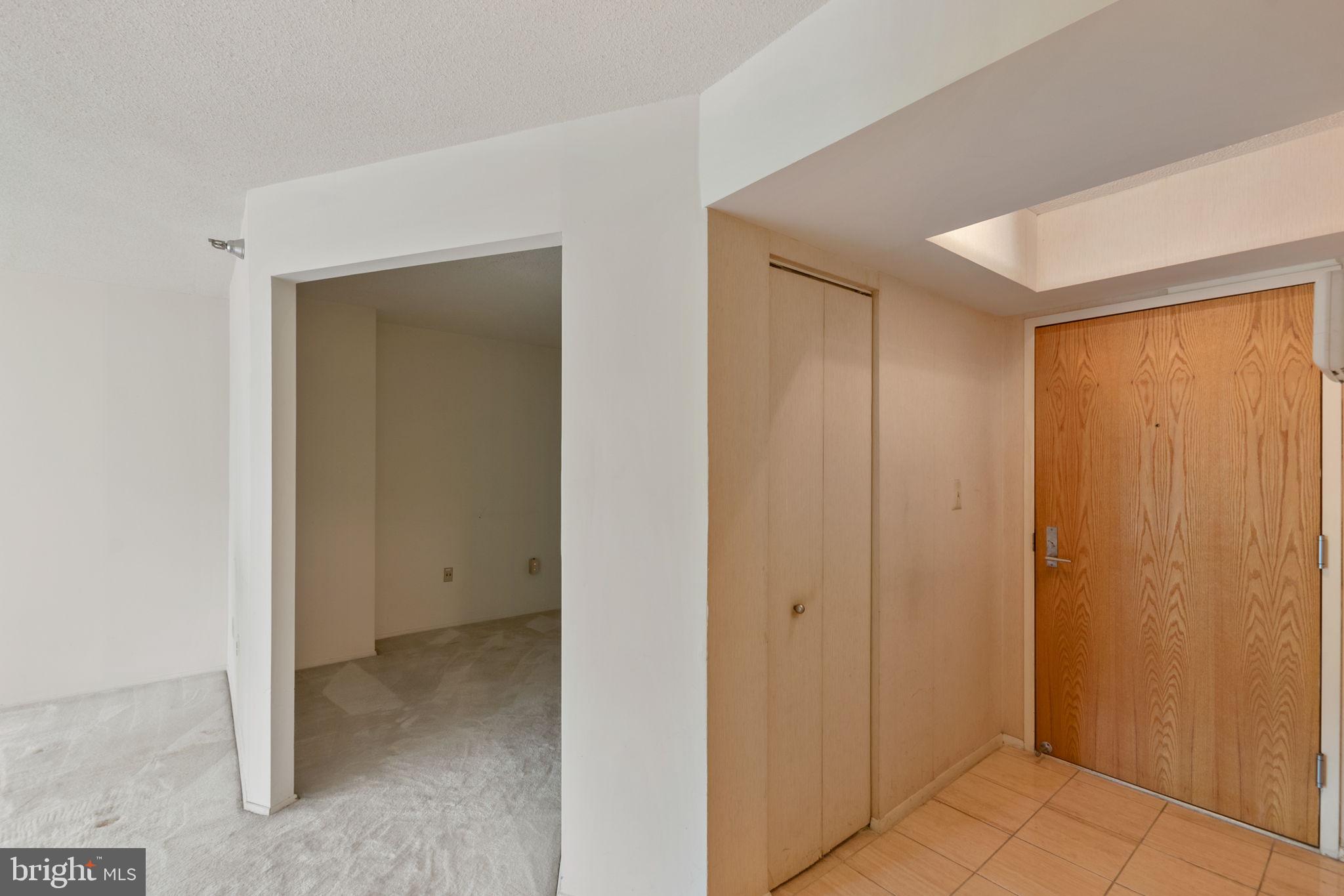 1808 Old Meadow Road, Unit 717 McLean, VA 22102 - Photo 8 of 48 Foyer entryway