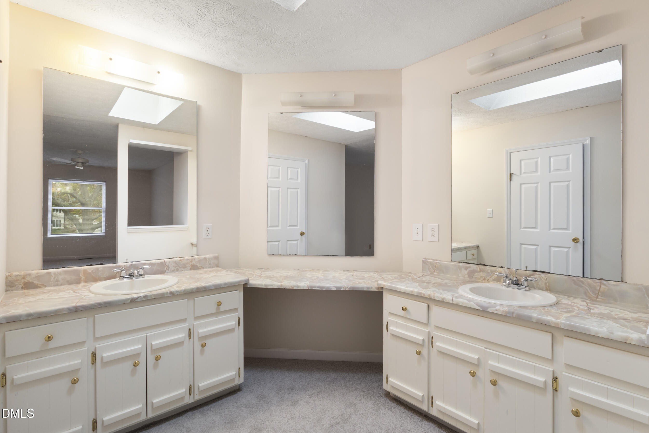 2001 Shenandoah Road Raleigh, NC 27603 - Photo 14 of 27 a bathroom with a granite countertop double vanity sink mirror and