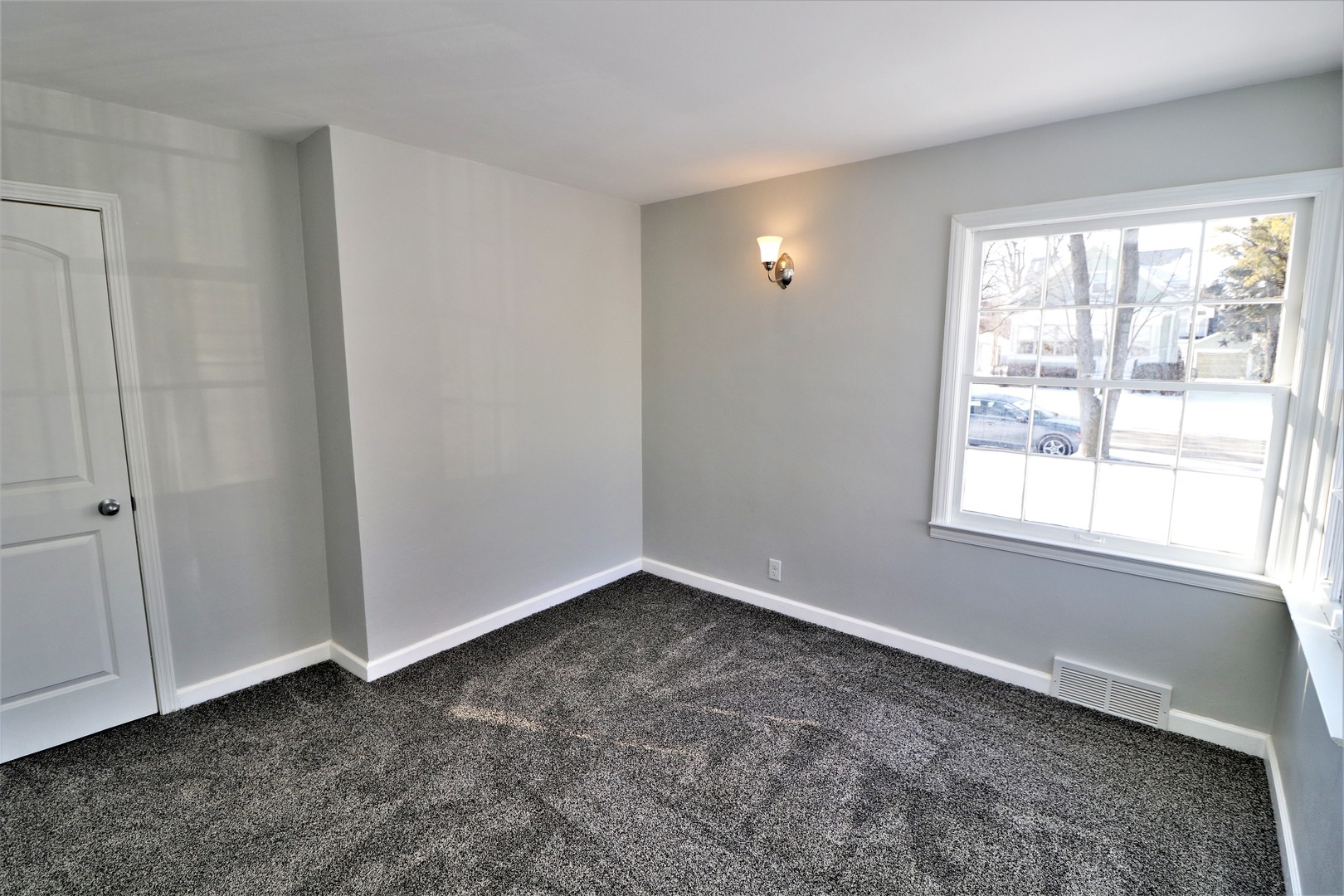 913 North Main Street Rochelle, IL 61068 - Photo 16 of 33 a view of an empty room with a window