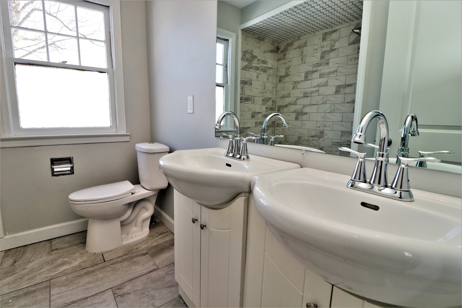 913 North Main Street Rochelle, IL 61068 - Photo 19 of 33 a bathroom with a sink toilet and a mirror