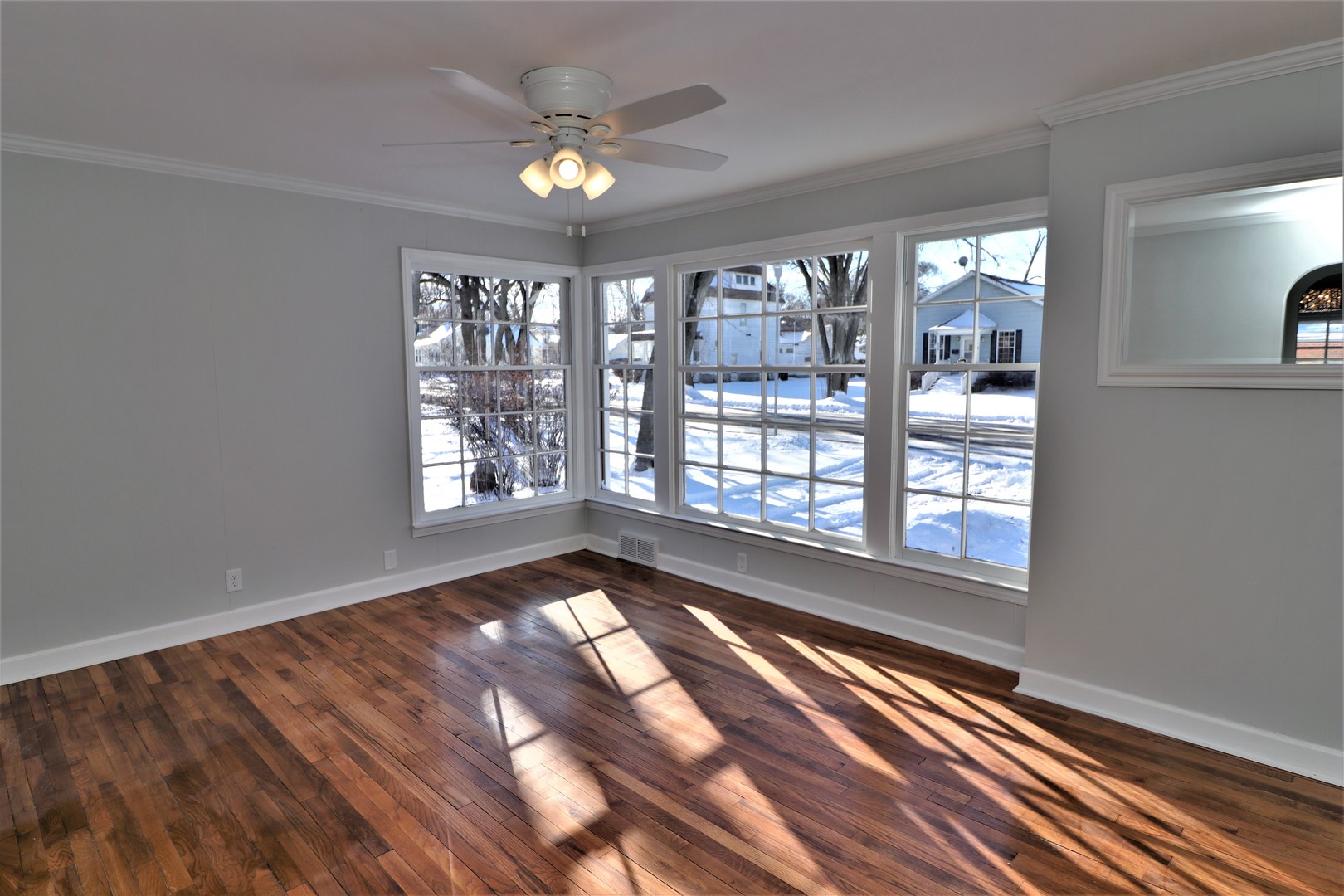 913 North Main Street Rochelle, IL 61068 - Photo 3 of 33 a view of an empty room and window