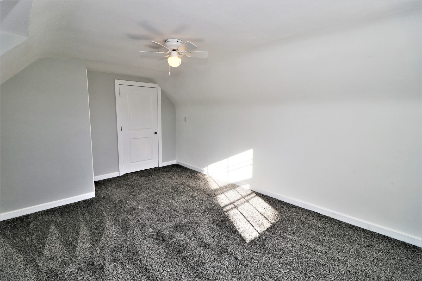 913 North Main Street Rochelle, IL 61068 - Photo 24 of 33 a view of an empty room with a window