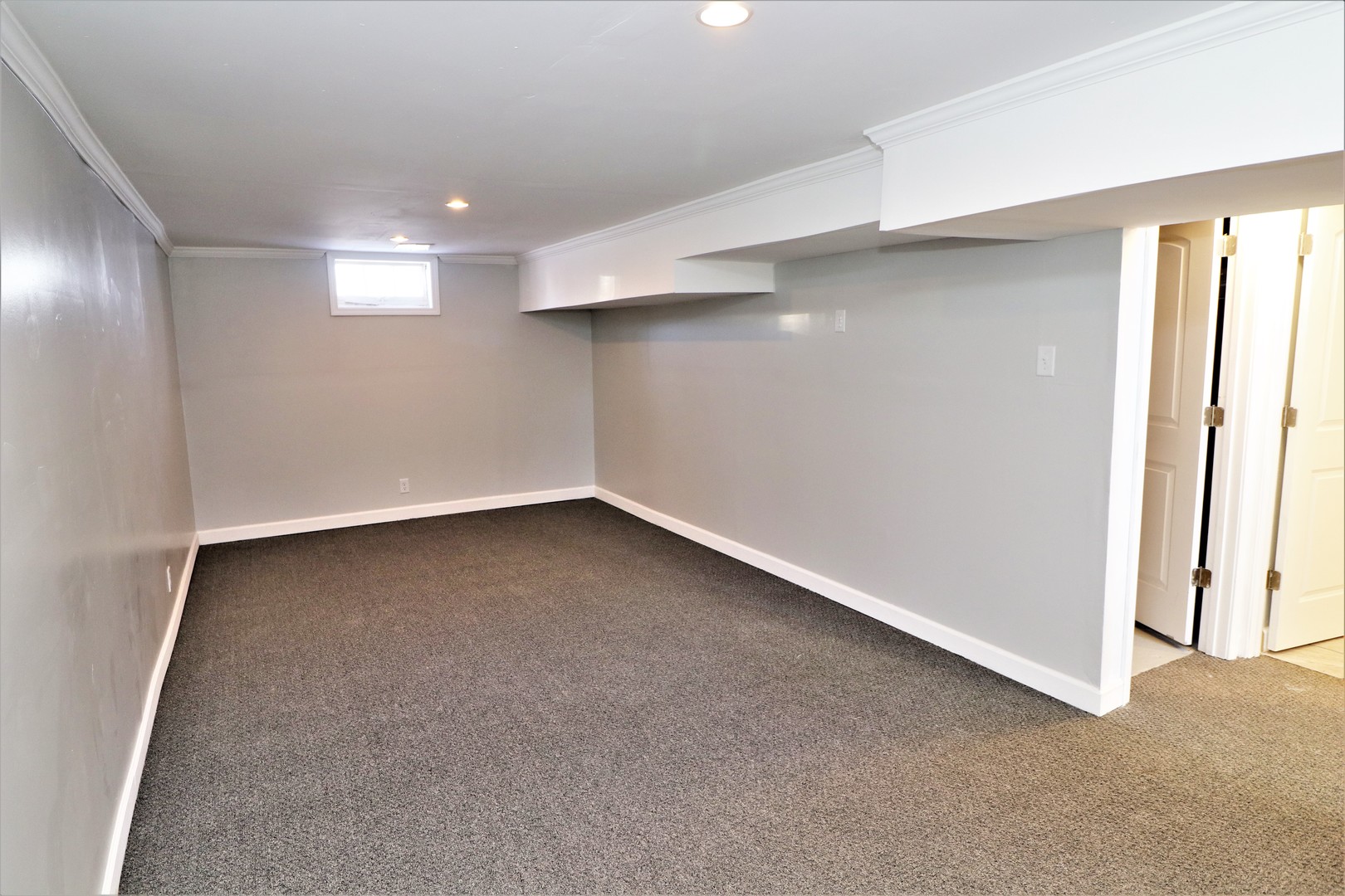 913 North Main Street Rochelle, IL 61068 - Photo 30 of 33 an empty room with a empty space and windows