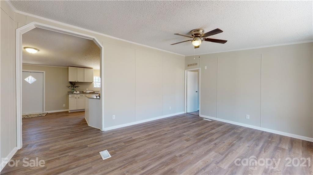 216 Cindy Road Salisbury, NC 28147 - Photo 14 of 34 a view of empty room with wooden floor