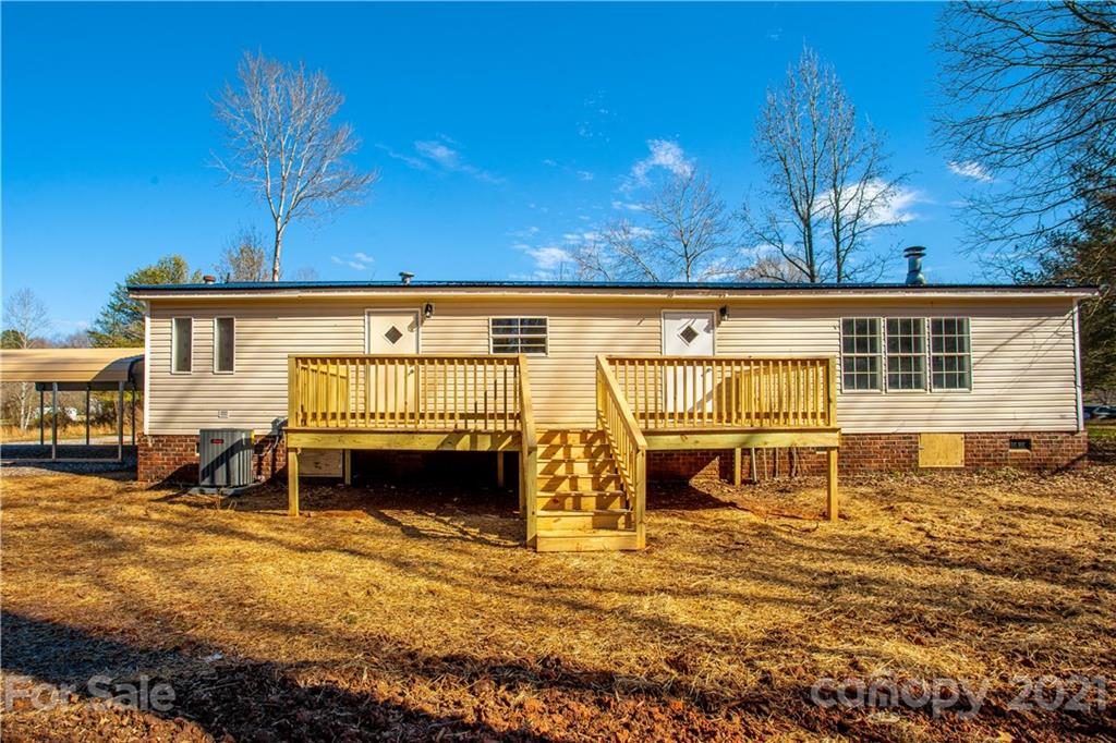 216 Cindy Road Salisbury, NC 28147 - Photo 8 of 34 a view of a house with backyard porch and sitting area