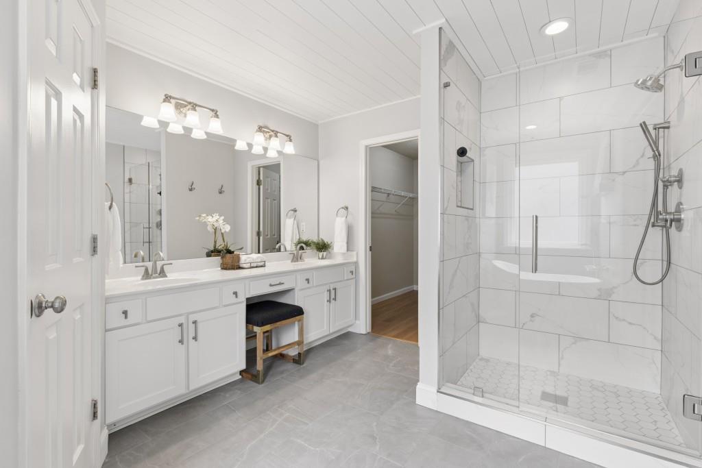 2120 Traywick Chase Alpharetta, GA 30004 - Photo 28 of 54 a bathroom with a double vanity sink mirror and shower