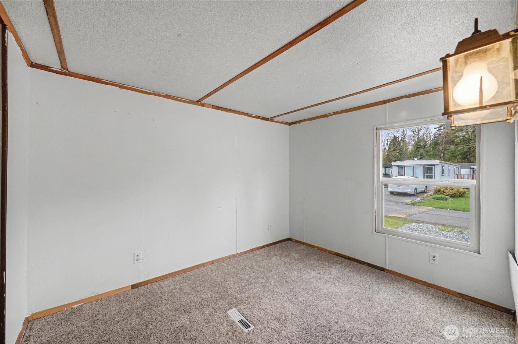 4672 Birch Bay Lynden Road, Unit 157 Blaine, WA 98230 - Photo 21 of 27 a view of an empty room with a window