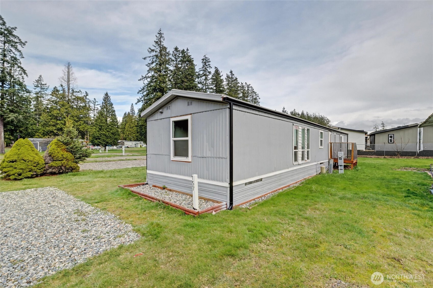 4672 Birch Bay Lynden Road, Unit 157 Blaine, WA 98230 - Photo 27 of 27 a view of a back yard of the house