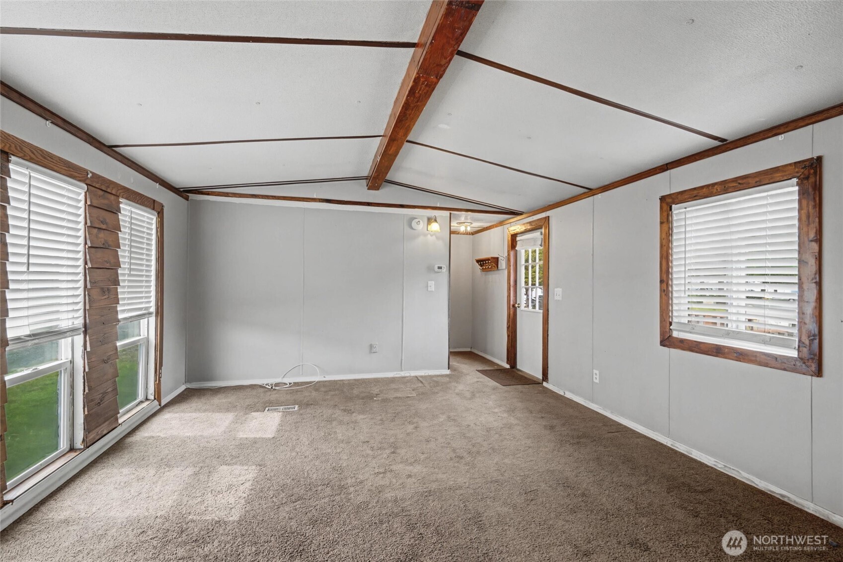 4672 Birch Bay Lynden Road, Unit 157 Blaine, WA 98230 - Photo 7 of 27 a view of an empty room with a window