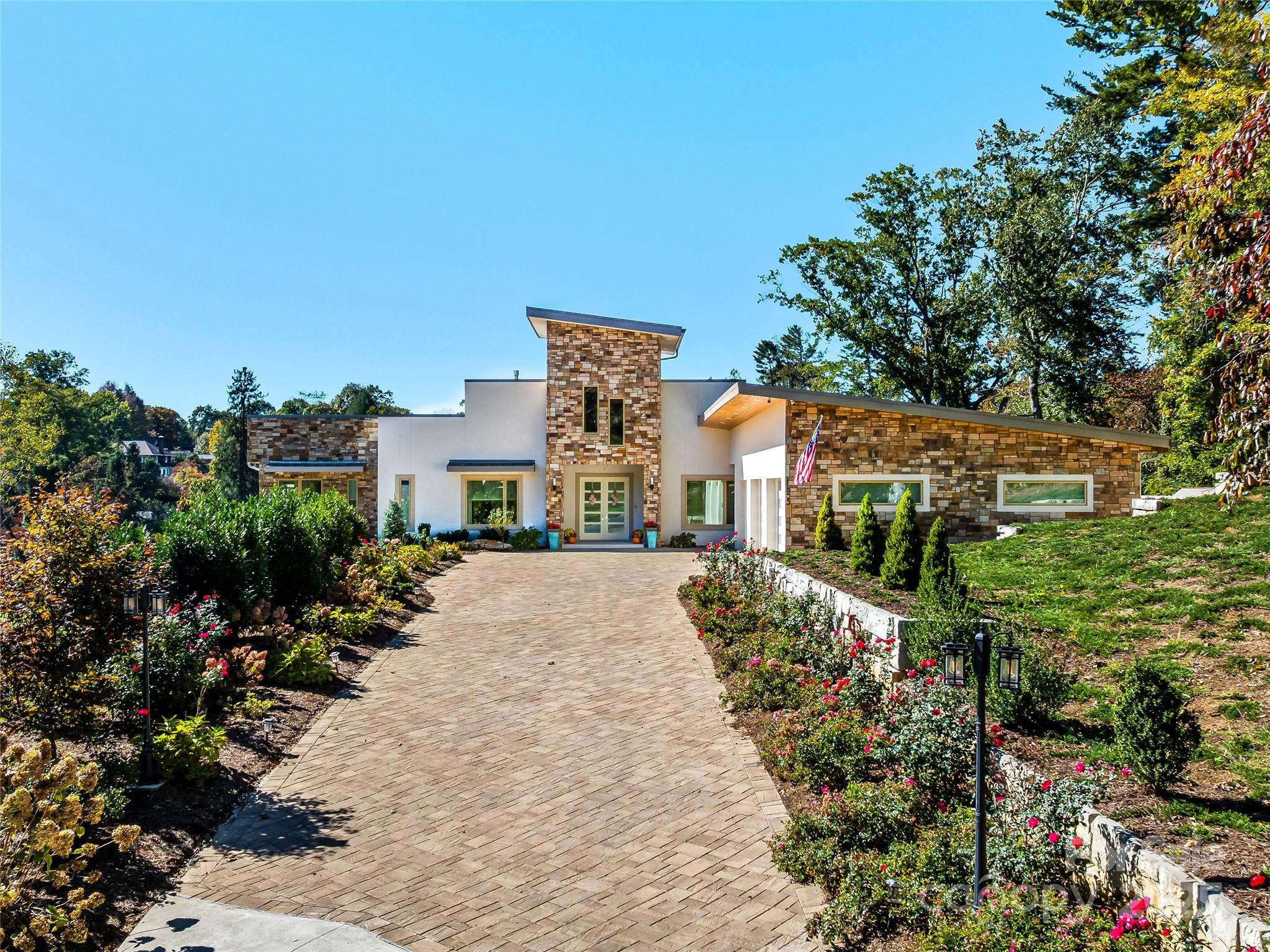 123 Wembley Road Asheville, NC 28804 - Photo 2 of 42 front view of a house with a yard
